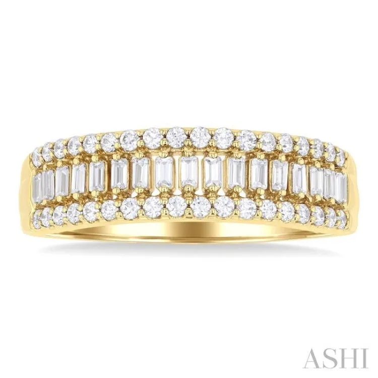 1/2 Ctw Channel Set Baguette and Round Cut Diamond Fashion Band in 14K Yellow Gold