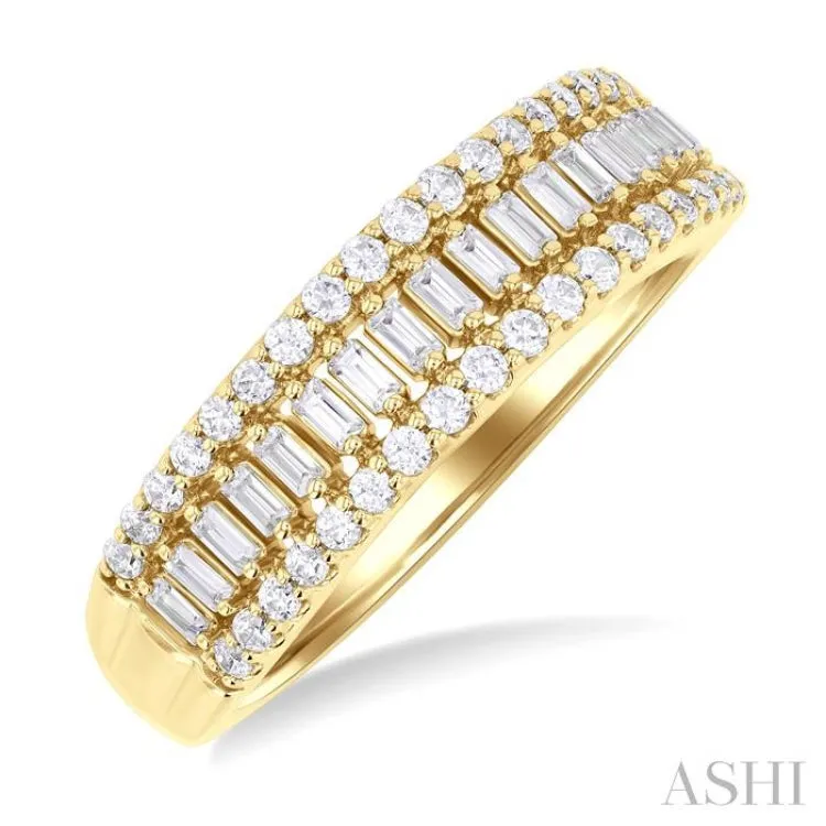 1/2 Ctw Channel Set Baguette and Round Cut Diamond Fashion Band in 14K Yellow Gold