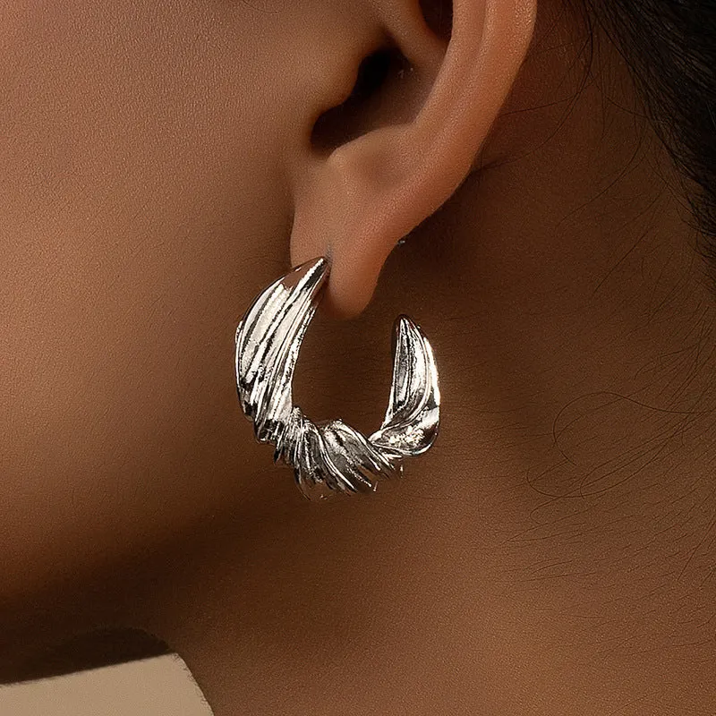 Chic Vienna Verve Metal Earrings with Unique Design