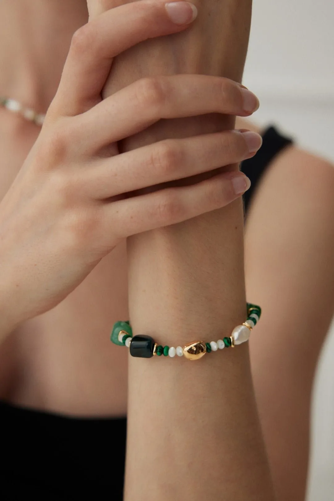 The Multielement Bracelet Featuring Malachite Pearls and Green Onyx