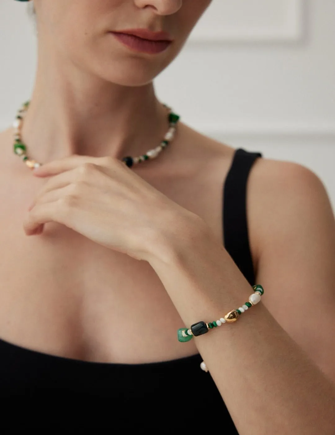 The Multielement Bracelet Featuring Malachite Pearls and Green Onyx